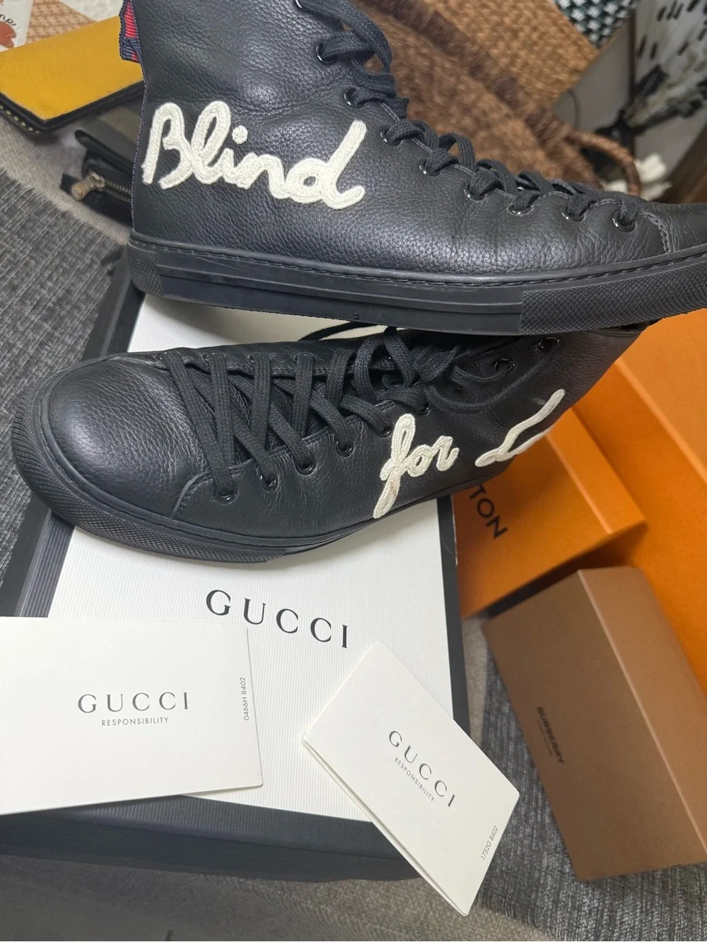 Gucci Black Leather High-Top Sneakers with White Script